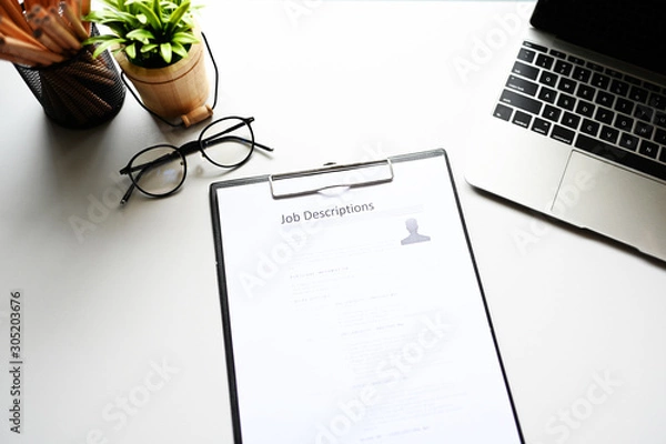 Obraz job description paper In office.