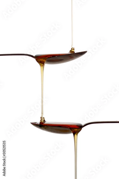 Obraz Spoons with syrup