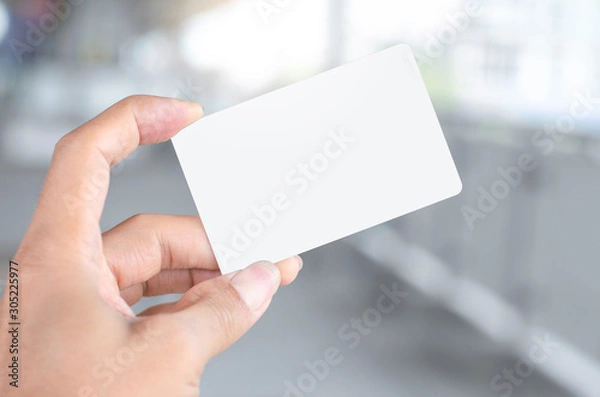 Fototapeta hand holding empty blank white business card mock up design text for advertisement  branding.