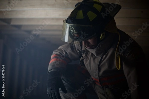 Fototapeta Fire fighter emotionally upset after finding something - ptsd