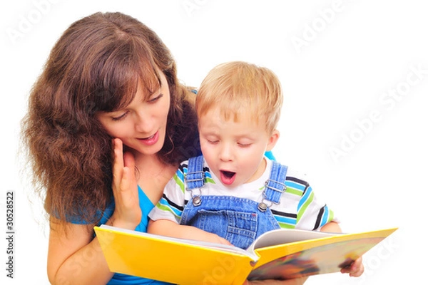 Obraz Young mum is reading a book with her cute son