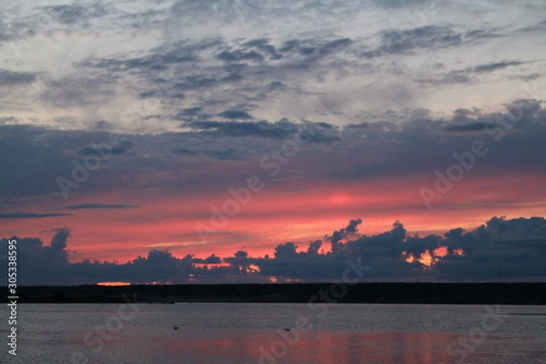 Fototapeta sunset over the river