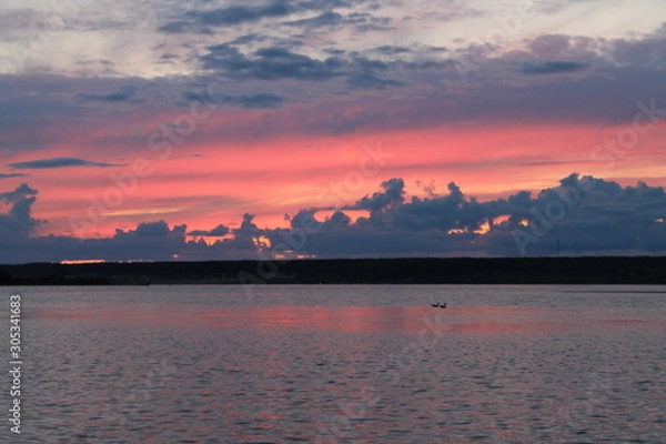 Fototapeta sunset over the river
