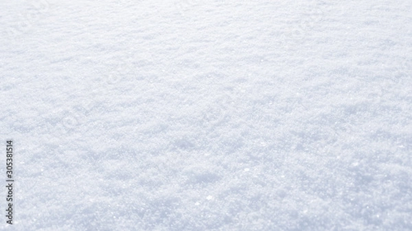 Fototapeta Winter snow background. The texture of fresh, clean, sparkling, freshly fallen snow