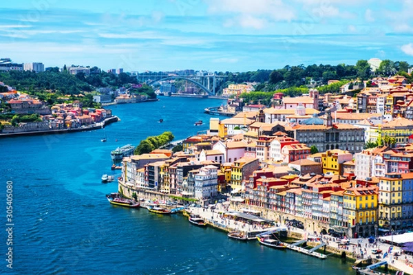 Fototapeta Aerial view of Ribeira area in Porto, Portugal during a sunny day with river