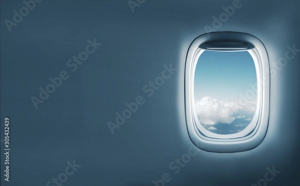 Fototapeta Aairplane window with clouds view