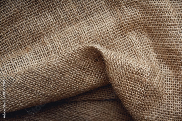 Fototapeta Burlap brown as a background image. Top view, copy space
