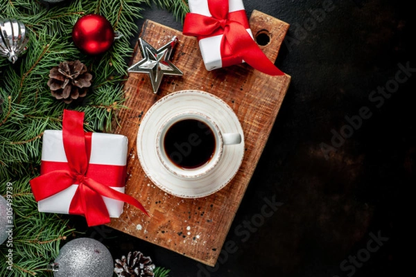Fototapeta Christmas coffee, tree and gifts, toys on a stone background with copy space for your text.