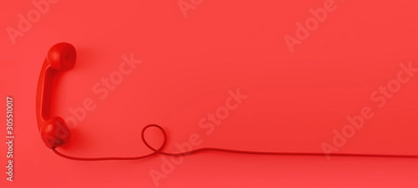 Obraz A red vintage dial telephone handset.