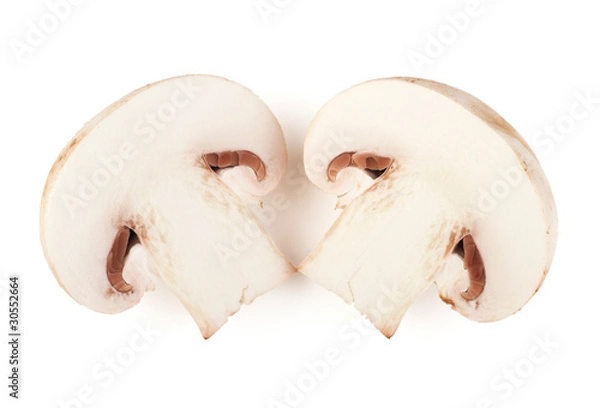 Fototapeta Two sliced champignon mushrooms on white backround