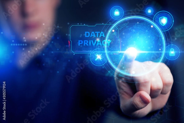 Fototapeta Cyber security data protection business technology privacy concept. Young businessman working  in the office, select the icon security on the virtual display. Data privacy
