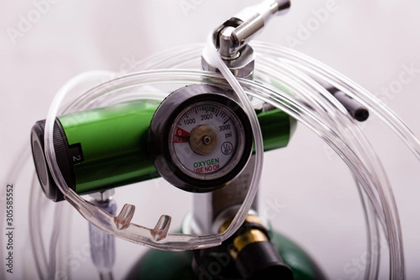 Obraz Close-up of a oxygen cylinder regulator and cannula