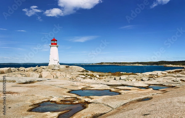 Obraz Panorama of Nova Scotia's iconic Peggys Cove Lighthouse on a sunny day