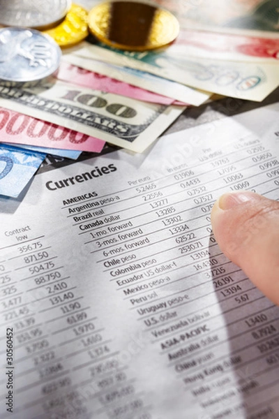 Obraz Observing foreign exchange sheet