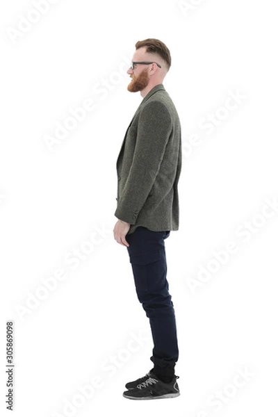 Fototapeta successful business man looking at blank screen . isolated on white