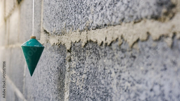 Fototapeta a plumb using a right angle measurement