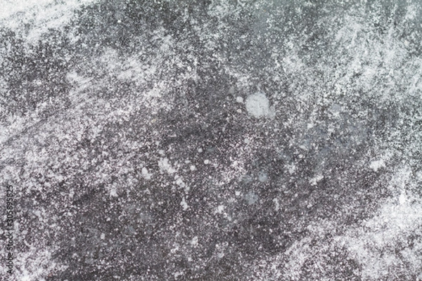 Fototapeta Textured ise of frozen lake. White snow on the surface. Winter template.