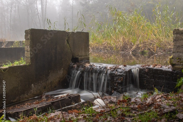 Fototapeta Small waterfall in the forest