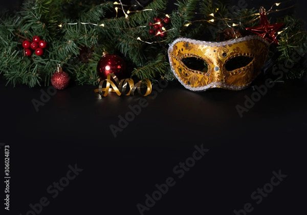 Obraz New year and Christmas background, masquerade mask ready for party invitation, traditional celebration