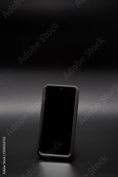 Obraz mobile phone on black background