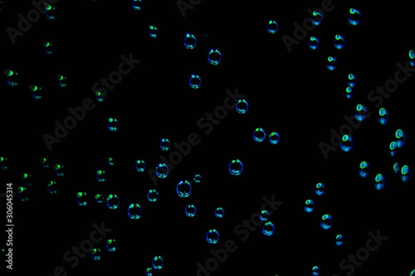 Obraz underwater bubbles black background