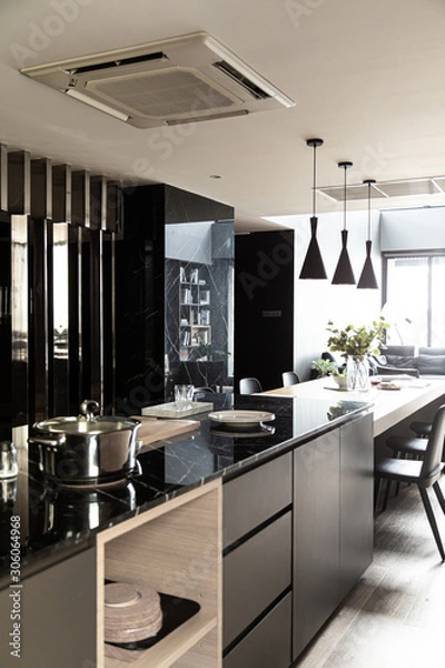 Fototapeta Pantry Corner in modern minimal style with stainless mirror partition compose with natural black marble wall in the background / cozy interior concpet / stylish interior / modern minimal style