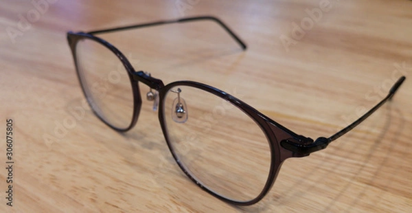 Obraz  eye glasses on table