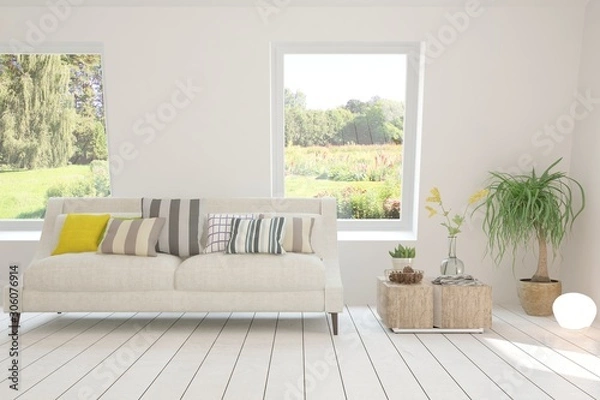 Fototapeta Stylish room in white color with sofa and summer landscape in window. Scandinavian interior design. 3D illustration