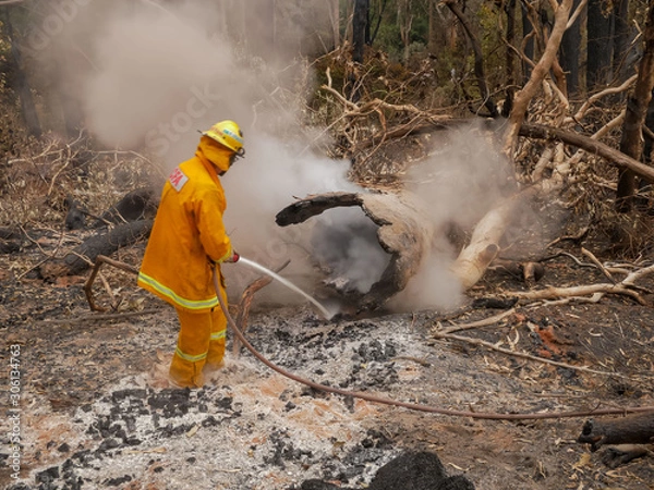 Fototapeta firefighter blacking out fireground