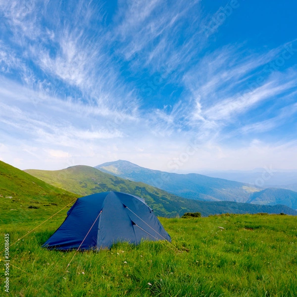 Obraz Tourists tent in mountain