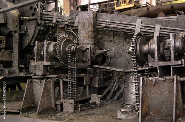 Obraz pipes machinery and steam turbine at plant Old gears rust chain oil