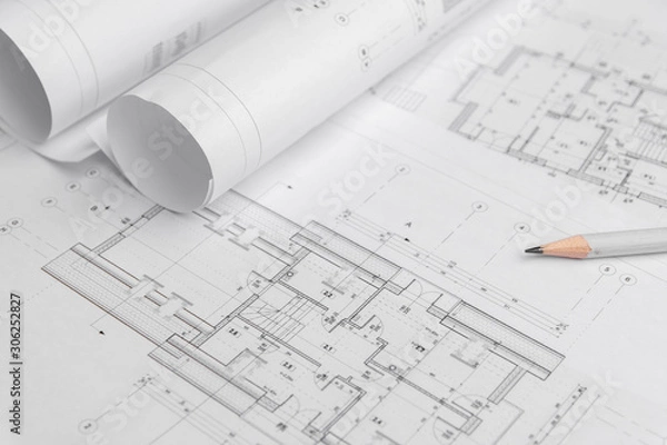 Obraz Architect rolls and architectural plan,technical project drawing