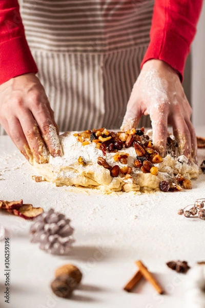 Fototapeta Baking a tradinional german fruit cake stollen. Christmas stollen