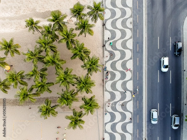 Obraz view of Copacabana boardwalk during late afternoon, taken with a drone, with the famous portuguese stone texture . Rio de Janeiro, Brazil