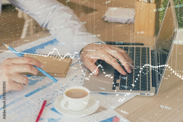 Fototapeta Forex graph with businessman working on computer in office on background. Concept of hardworking. Multi exposure.