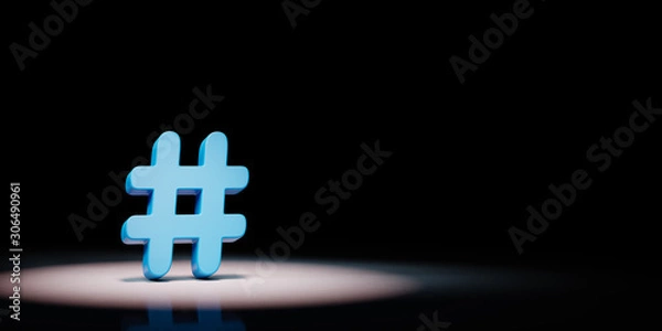Fototapeta Hash Symbol Spotlighted on Black Background