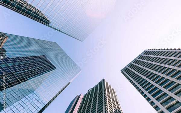 Fototapeta Śródmieście Calgary, Alberta, Kanada. Pionowe, szerokokątne widoki nowoczesnej architektury tworzącej drapacze chmur w centrum Calgary, Alberta, Kanada.