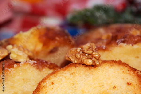 Fototapeta Christmas cake with nuts and orange