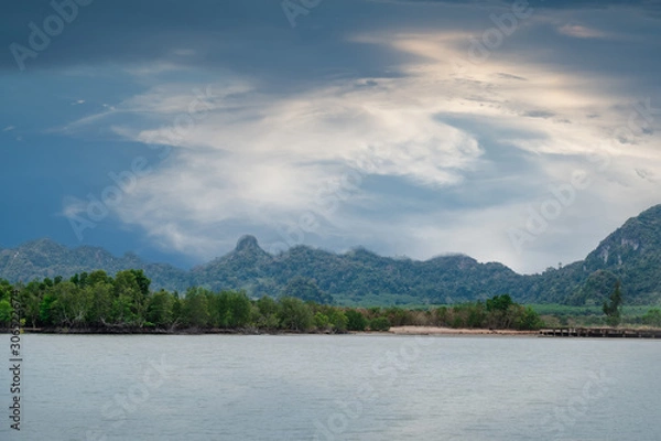 Obraz Beautiful seascape with the island on the background of blue sky on sun shine day.