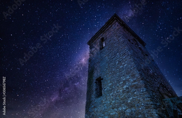 Fototapeta Magical Landscapes of the stars and the milky way with mountains and waterfalls with winter scenics for wallpaper backgrounds.