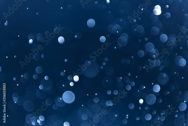 Obraz abstract sparkle bokeh light effect with navy blue background
