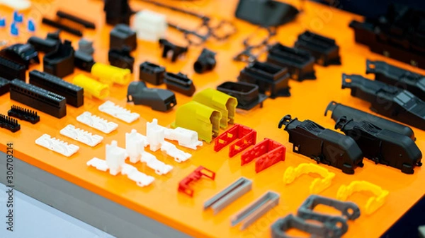 Fototapeta Plastic and rubber parts of automotive manufacturing by high precision mold injection in the factory