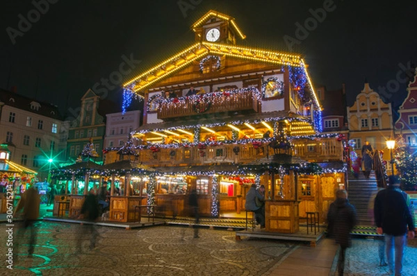 Obraz Wroclaw, Poland, October 2019. Christams market in main square Market Square in colorful illuminations and decorations