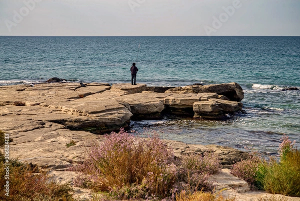 Obraz Рыбак с удочкой на берегу Каспия