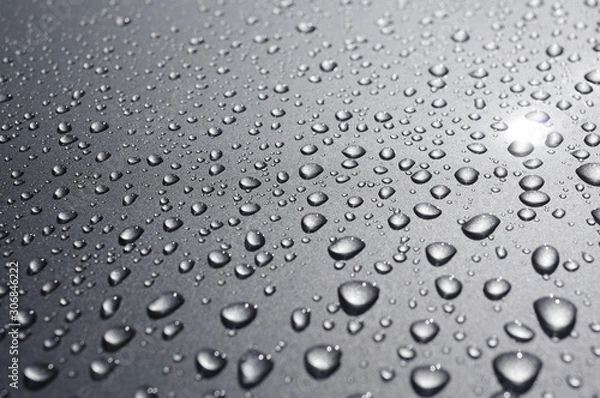 Fototapeta Water drops on metallic surface