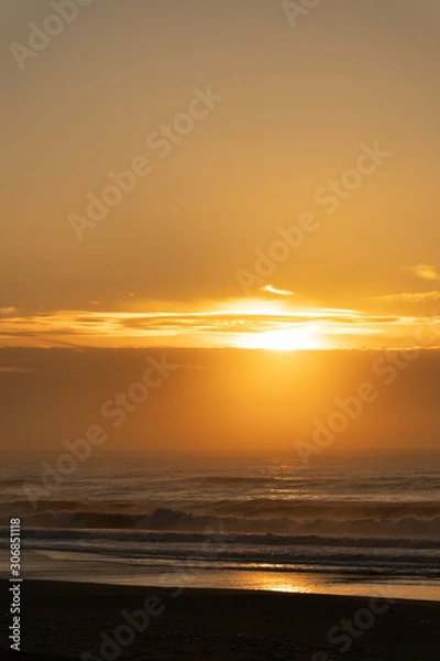 Obraz 夕日に染まる海