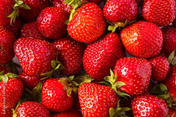 Fototapeta Background of fresh strawberries. Ripe strawberries. Ripe berries close-up. Various fresh summer berries. Background of red berries.