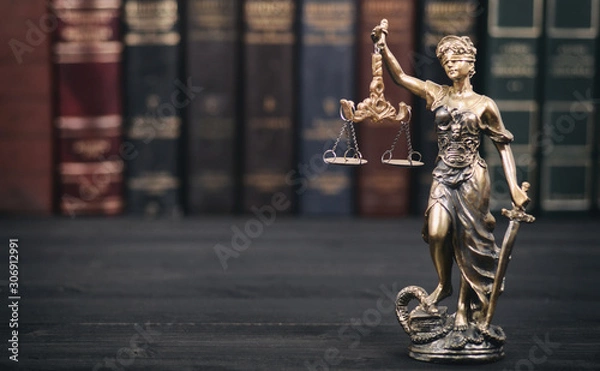 Fototapeta Scales of Justice, Justitia, Lady Justice and Law books in the background.