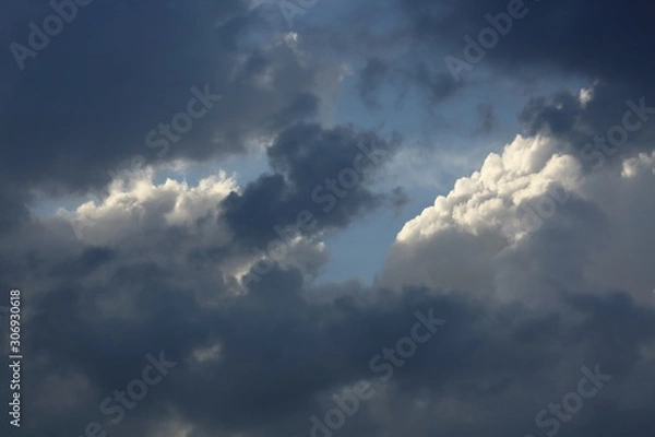 Fototapeta sunlight through cloud on dramatic sky background