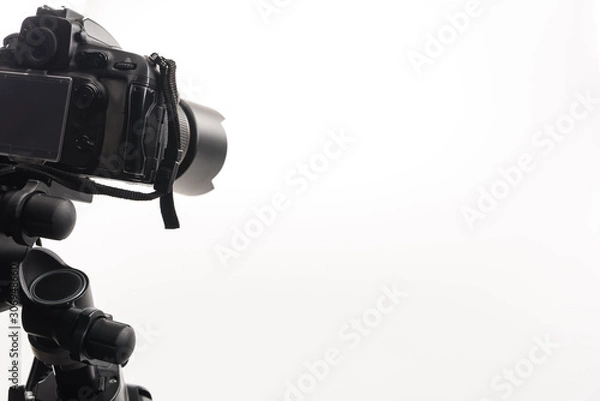 Fototapeta black professional digital camera isolated on white